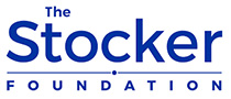 Logo of The Stocker Foundation. The text "The Stocker Foundation" is displayed in bold blue font, with "The" located at the top left corner, "Stocker" in large letters in the center, and "FOUNDATION" in smaller letters underneath, separated by a blue horizontal line.